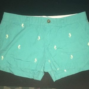Seahorse teal shorts with yellow seahorses